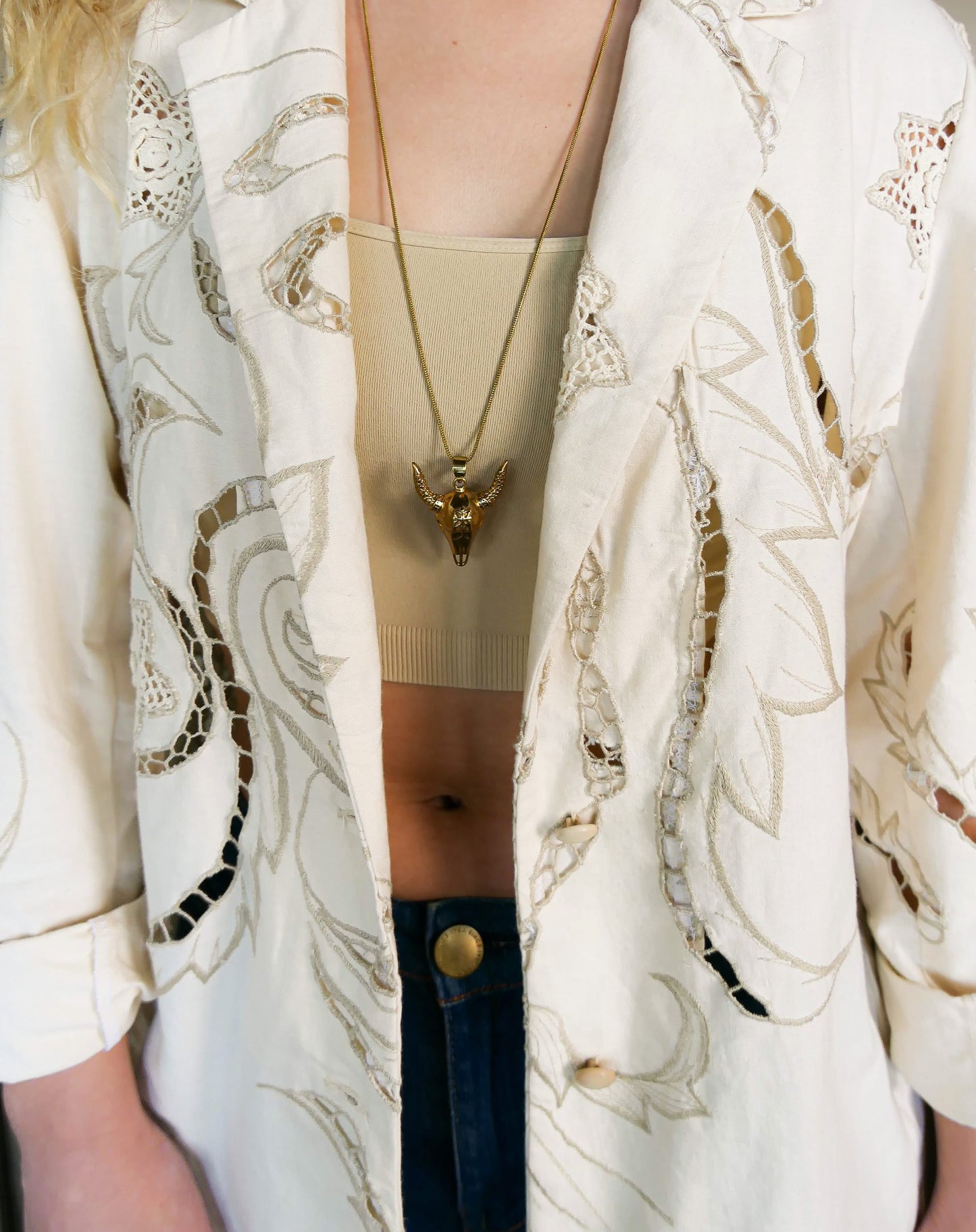 Lim's Vintage oversized cotton blazer with embroidered floral and leaf motif: Your everyday oversized cotton blazer that will put a definite skip in your step. This blazer is made from our Lim's Vintage cutout and embroidered fabric with a floral and leaf motif, and hand crocheted embellishments throughout. Comfortable, lightweight, and falls below the hip.