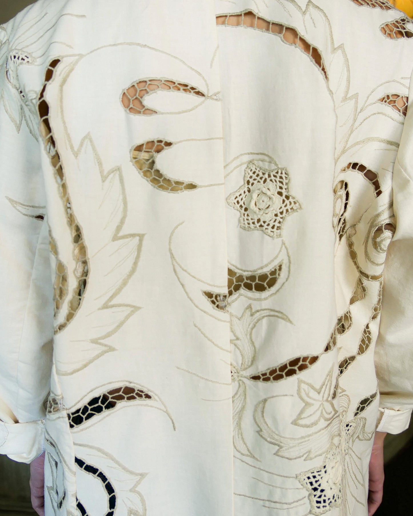 Lim's Vintage oversized cotton blazer with embroidered floral and leaf motif: Your everyday oversized cotton blazer that will put a definite skip in your step. This blazer is made from our Lim's Vintage cutout and embroidered fabric with a floral and leaf motif, and hand crocheted embellishments throughout. Comfortable, lightweight, and falls below the hip.