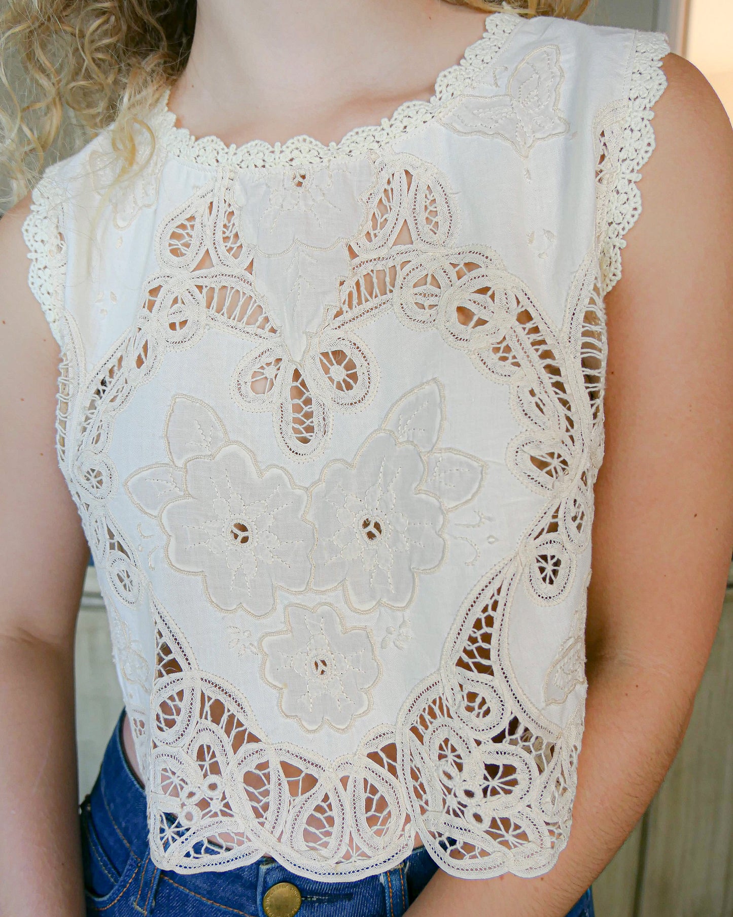Romantic, boho chic, goes-with-everything crop tank top made with Lim's Vintage embroidered Battenberg lace fabric with a butterfly and floral motif. Goes well with jeans or denim skirt and cowboy boots or sandals.