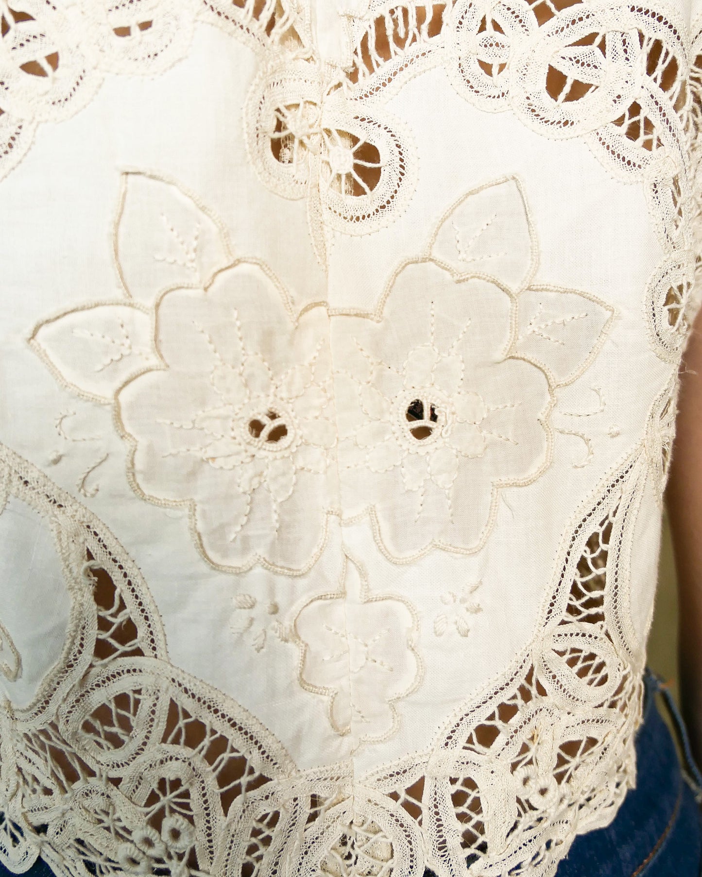 Romantic, boho chic, goes-with-everything crop tank top made with Lim's Vintage embroidered Battenberg lace fabric with a butterfly and floral motif. Goes well with jeans or denim skirt and cowboy boots or sandals.